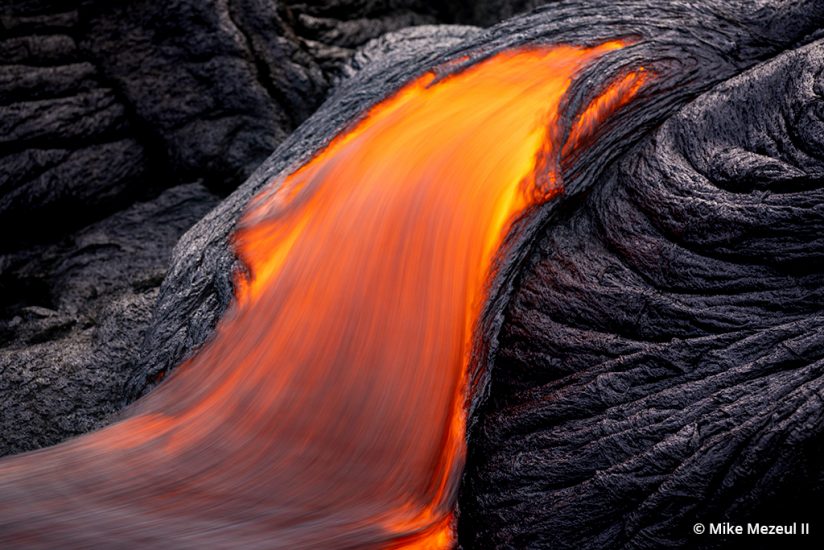 A long exposure photograph of the waterfall-like motion within a pahoehoe flow of Fagradalsfjall.