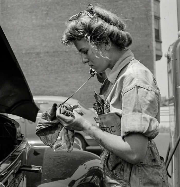 A Woman Mechanic At Atlantic Auto Service Working On An Engine In Philadelphia, Pennsylvania, 1943 - Rare Vintage Photos