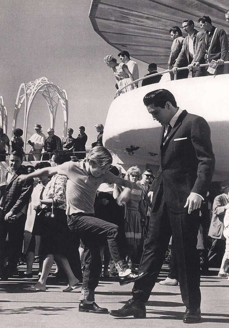 Young Kurt Russell kicking Elvis Presley in the shin, 1963.