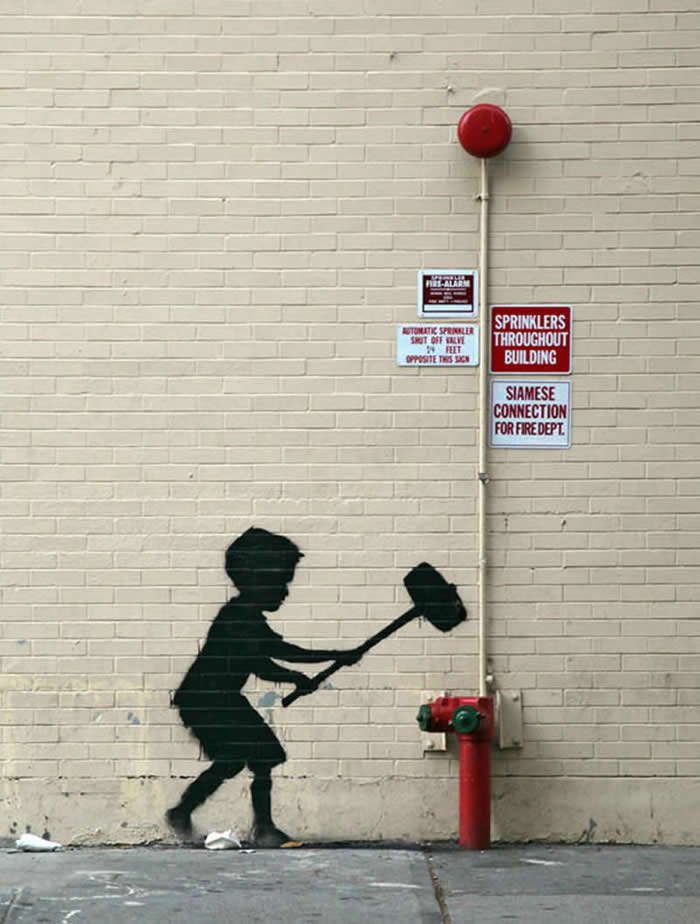Fire Hydrant Smash: A Kid’s Rebellion Against the System - Clever Street Art Photos