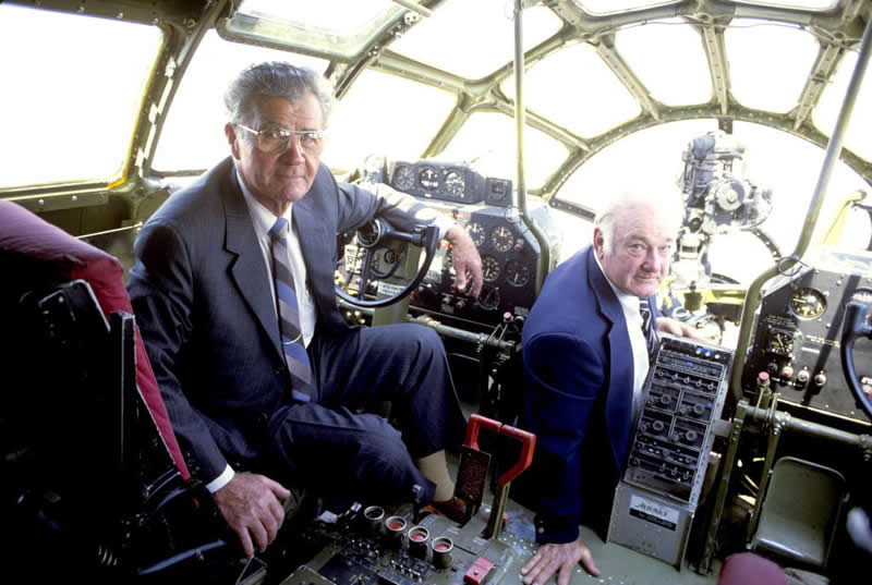 Paul Tibbets (1915–2007), Brigadier General in the United States Air Force, and Colonel Thomas Ferebee (1918–2000), in the cockpit of the Boeing B-29 Superfortress bomber 'Enola Gay' that they crewed to drop the first atomic bomb on Hiroshima in 1945. Photo taken in 1981.