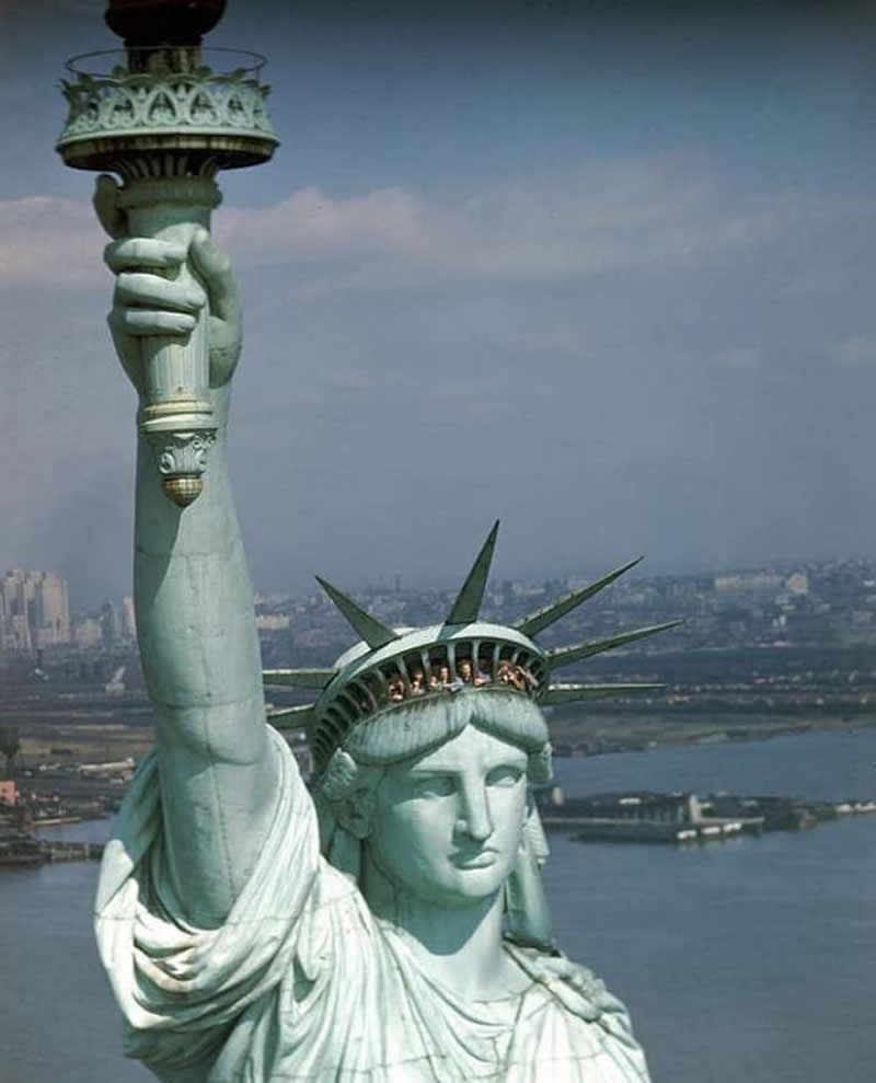 Tourists at the Statue of Liberty’s crown in New York City, 1947.