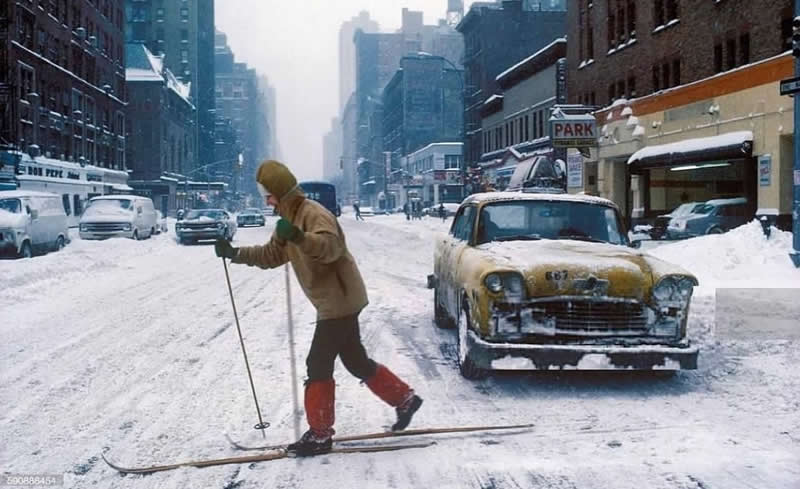 Skiing on 77th Street and Amsterdam Avenue after a blizzard. (New York City, 1978). Photo by Homer Sykes.