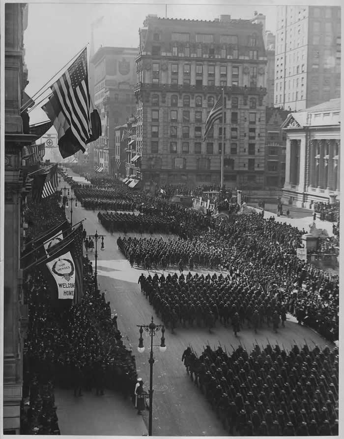 Old New York Revealed: 35 Rare Historical Photos That Capture Forgotten Moments 53 Parade in honor of returned fighters from World War I passing the Public Library, New York City. ca. 1919.