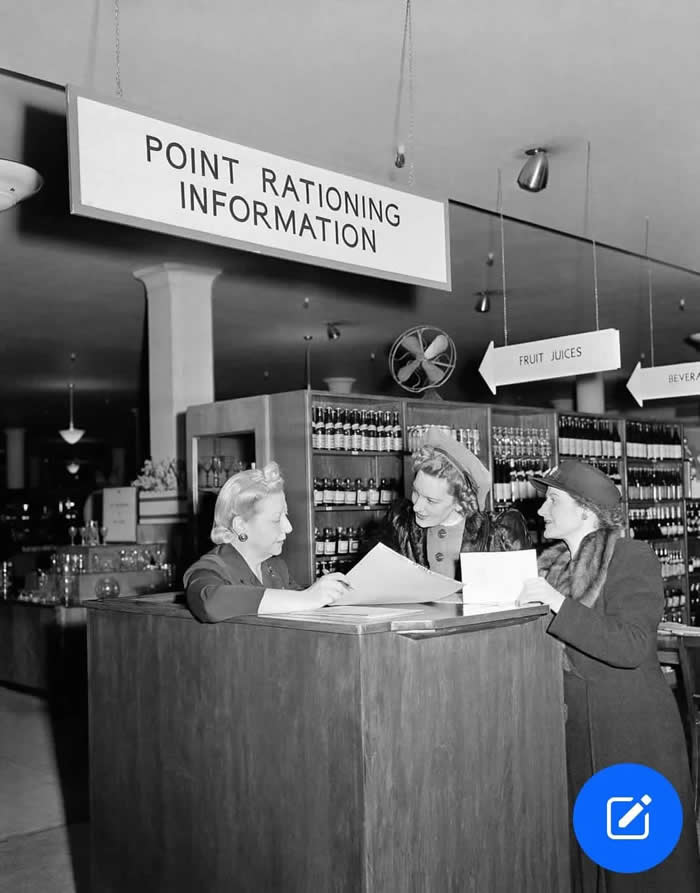 Old New York Revealed: 35 Rare Historical Photos That Capture Forgotten Moments 66 Shopping with a point rationing coupon on the first of rationing, at Macy's department store in New York, 1943.