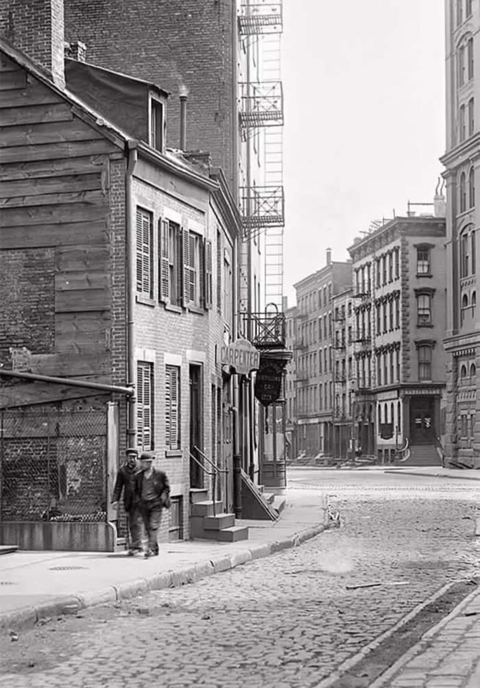 Old New York Revealed: 35 Rare Historical Photos That Capture Forgotten Moments 41 New York, circa 1890. Street view, 21-23 Pearl Street.