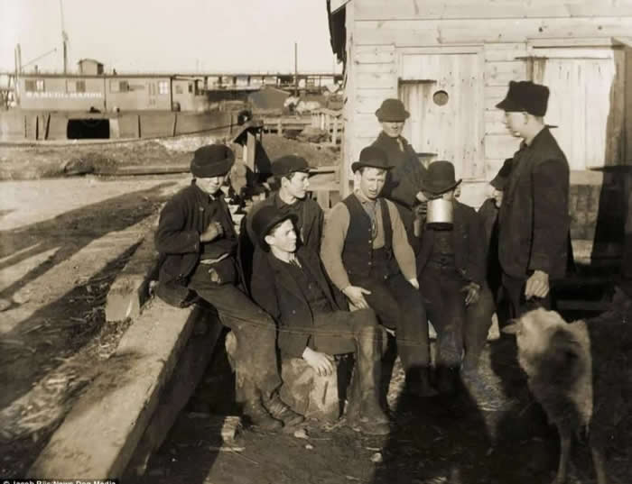 Old New York Revealed: 35 Rare Historical Photos That Capture Forgotten Moments 46 Here are the members of "The Montgomery Guards" street gang, lounging by the docks near the Five Points District in Lower Manhattan, 1900. Photographer: Jacob Riis.