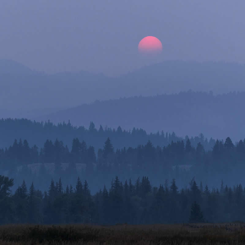 Landscapes - Gold Winner: As the Sun Emerged from the Wyoming Wildfires by Michael Mihaljevich - 1839 Awards Color Photography Contest 2026 Winners