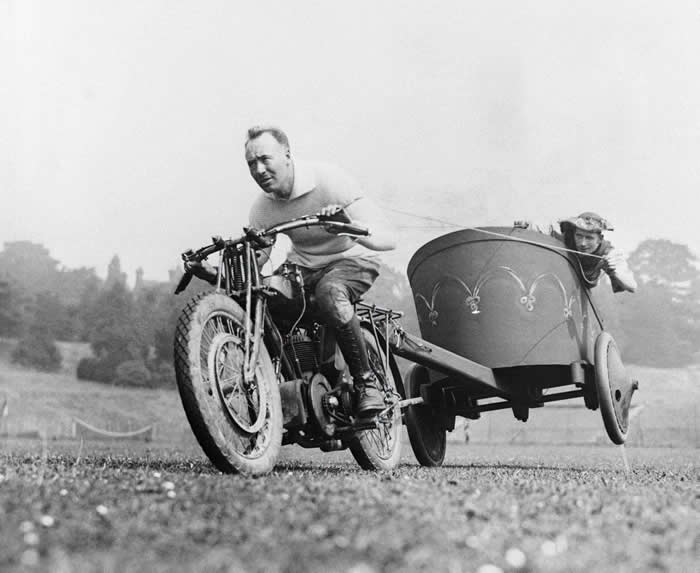 History Uncovered: 40 Powerful Photos That Change How We See the Past 70 Two men participating in a motorcycle chariots race, 1925.