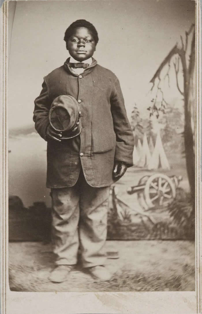 Frozen in Time: 38 Powerful Historical Photos That Bring Forgotten Moments Back to Life 72 Civil war drumer boy posing on his uniform with his cap on hand, circa (1863)