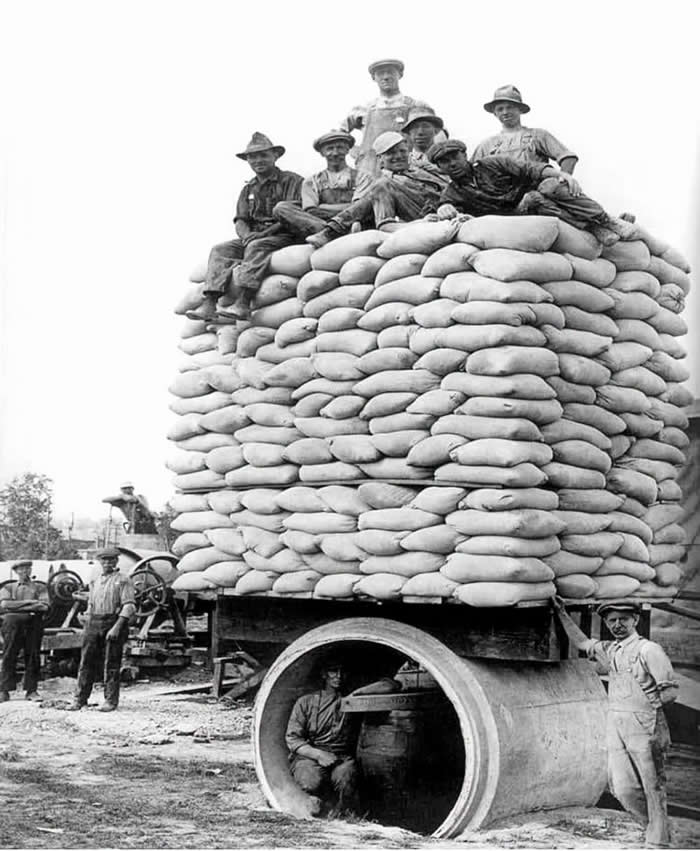 Frozen in Time: 38 Powerful Historical Photos That Bring Forgotten Moments Back to Life 75 Inventor of the precast pipe trust the engineering of his invention to not be crushed by over 21 tons, Canada 1920