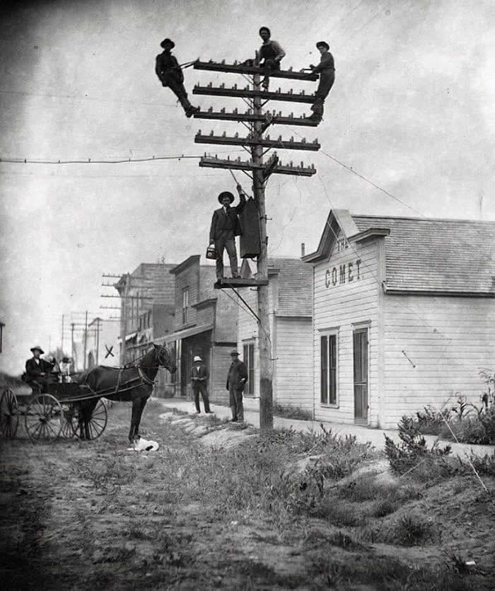 The Past Unfiltered: 34 Rare Historical Photos That Reveal the Human Side of History 56 Telephone lines go up in Courtland, Kansas, 1903