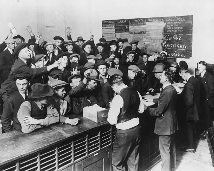 The Past Unfiltered: 34 Rare Historical Photos That Reveal the Human Side of History 39 Crowd of men at Employment Office Desk, during the Great Depression.