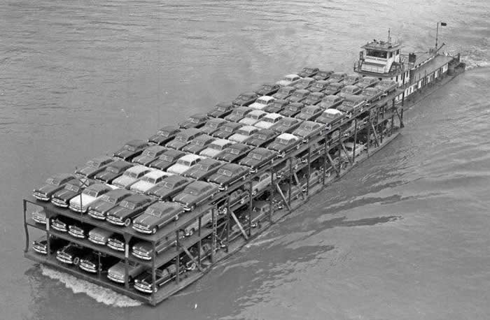 The Past Unfiltered: 34 Rare Historical Photos That Reveal the Human Side of History 44 Brand new 1949 Fords are heading down the Mississippi to the dealers.