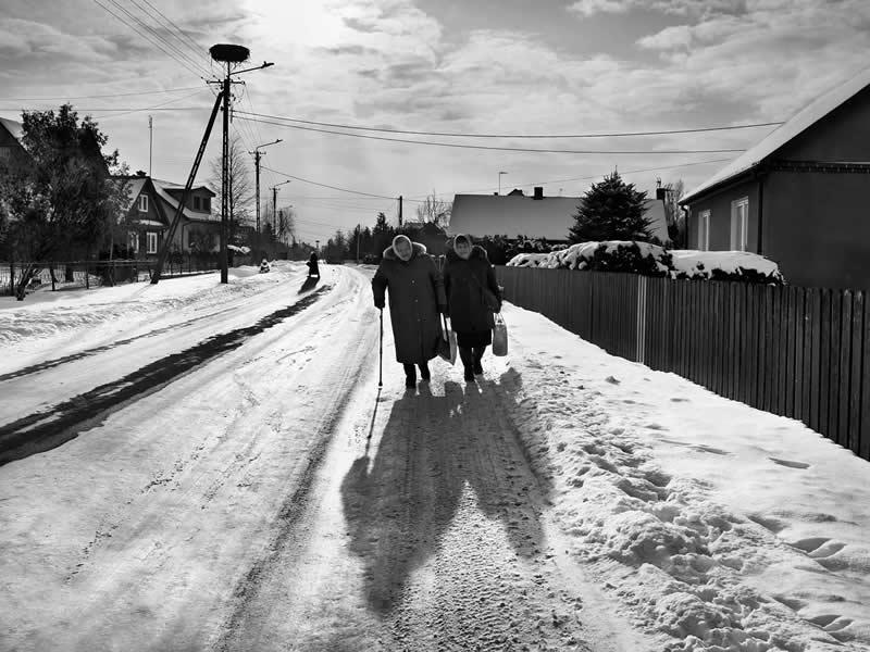 Where the Earth Remembers: Oliver Klink's Moving Portrait of Rural Life and Memory 34 Rough Winter, Shared Steps, Poland - Where the Earth Remembers by Oliver Klink