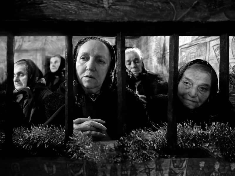 Where the Earth Remembers: Oliver Klink's Moving Portrait of Rural Life and Memory 35 Shared Devotion, Unbroken Ritual, Romania - Where the Earth Remembers by Oliver Klink