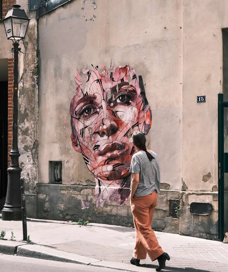 Celebrate Creativity: 30 Epic Street Murals That Will Change the Way You See Cities 52 Wall in Paris, France - Epic Street Murals That Will Change the Way You See Cities